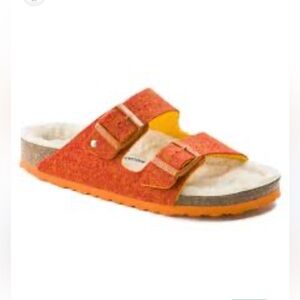 Birkenstock Arizona sandals in a red/orange wool material with yellow trim